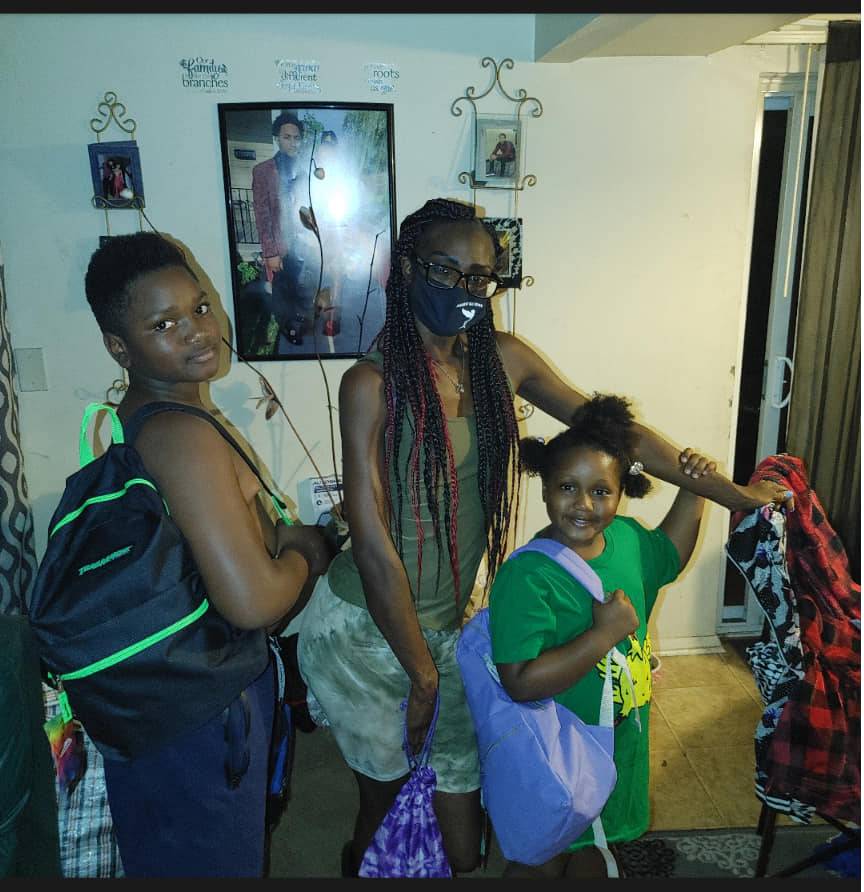 Siblings with Their New Backpacks