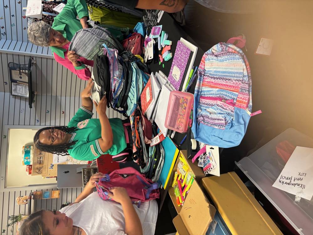 Volunteers Packing School Supplies