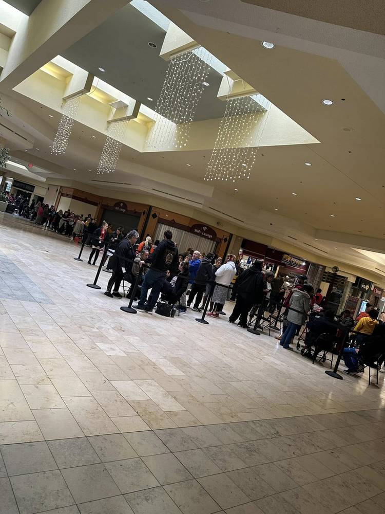 Families Lined Up for the Giveaway